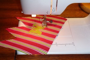 Sewing on the applique letter